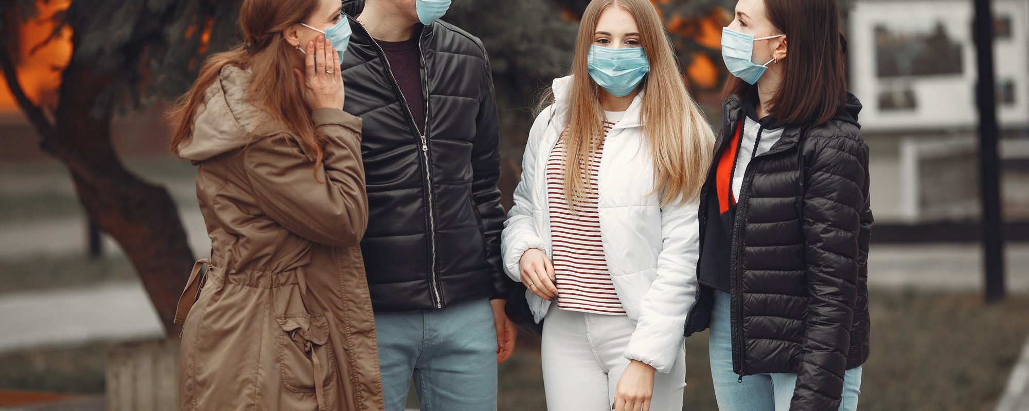 Young people are spreading disposable masks outside